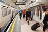 Passengers on London Underground's Piccadilly Line wearing coronavirus face coverings