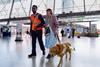 A member of staff helps a blind customer at Stratford London Underground station (Photo TfL)